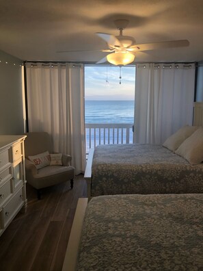 Another view of bedroom overlooking water