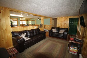 Primary Living Room View Towards the Kitchen and Dining Area