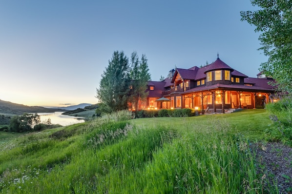 House in summer looking down toward lake