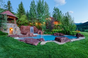 Swimming pool, waterfall and hot tub