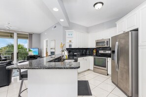 full kitchen with updated stainless steel appliances