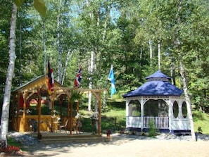 screened gazebo and outdoor bar area