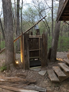 Ten Acre Treehouse, “Fort Henry Log Cabin”.  Sleeps 2-4