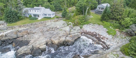 Aerial View of full property, showing house and cottage.  