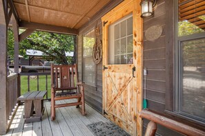 Warm and welcoming Lone Star touches help make the shaded porch a relaxing fresh-air haven.