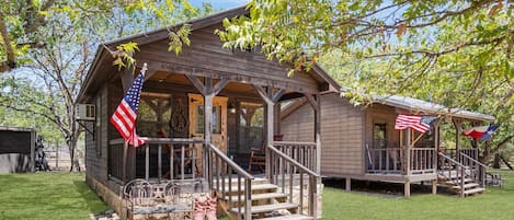 The Cowboy Cabin at Double U Barr Ranch is a scenic waterfront getaway, with all the perks of having Bandera close by!