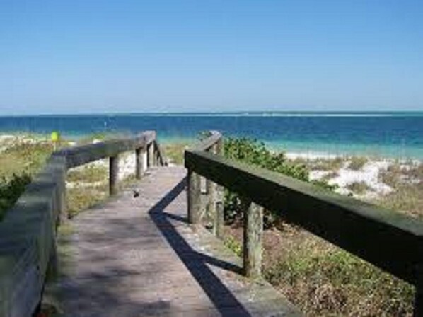 Bean Point access bridge end of our road,   8-10 minute walk at bayside beach