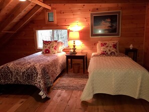 Twin beds in an upstairs bedroom.