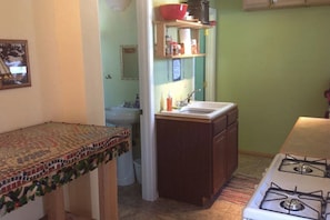 Private bathroom/shower and shared kitchen 40 feet away in "Bathhouse"