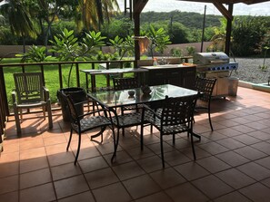 Outdoor dining, grill and prep area 