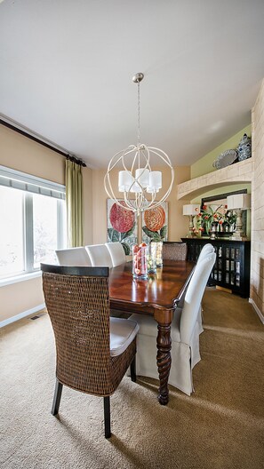 Bright dining room and space for more to spread out for dinner.