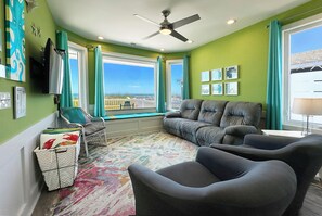 Living Room area.  Notice bench seating by window.