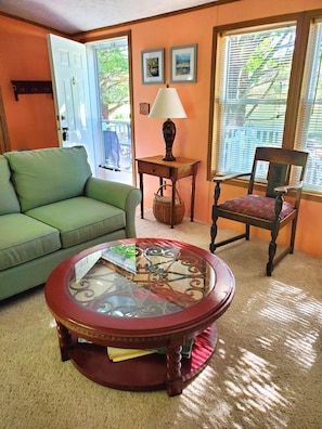 Cozy living room with deck outside front door