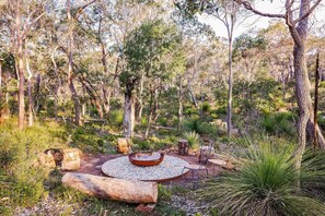 A fire pit encourages cosy evenings under the stars telling storeies.