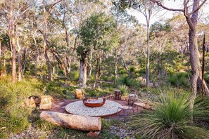 A fire pit encourages cosy evenings under the stars telling storeies.