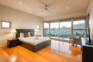 Enjoy added privacy in the separate second bedroom, featuring a cosy queen bed, ensuite bathroom, and verandah with stunning views.