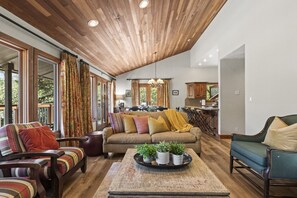 Enjoy the cozy Family room fireplace with views of the mtn