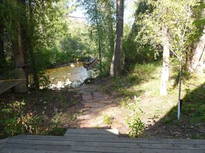 Back deck. Short walk to river.