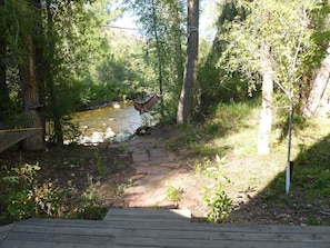 Back deck. Short walk to river.