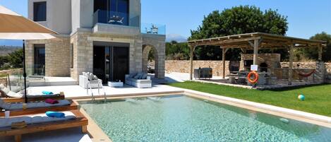 Boutique House, pool and barbeque/dining terrace. 