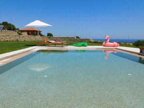 Boutique House pool with sea view, swim jets, and massage jets.