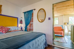 Casita Roja - bedroom & view of living room/futon bed