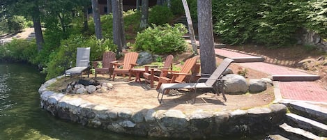 Perched beach w/fire pit; steps to clear water with sandy bottom - from dock.