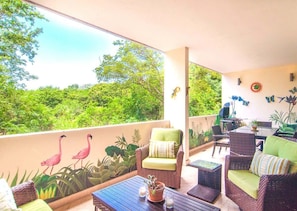 Very large covered terrace with hand-painted mural