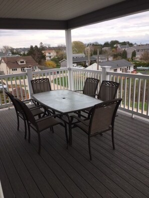 Covered deck with gorgeous sunsets