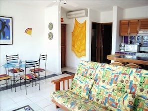 Breezy living room, dining area,  and traditional tiled kitchen, fully equipped