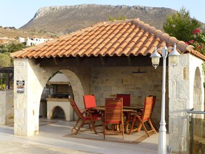 Pool cabaña and BBQ area.