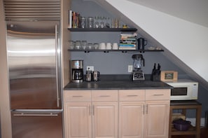 Kitchen has Sub-Zero fridge, new Cuisinart coffee maker and Vitamix