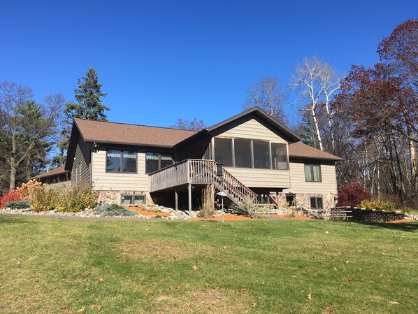 Spacious 4 1/2 acres with 322 ft of Lakeshore, Hard Sandy Bottom Lake