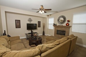 Family Room- w/ flat screen T.V. DVD player, movies, sofa sleeper/ recliner, etc