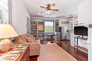 Single sleeper sofa and dining area