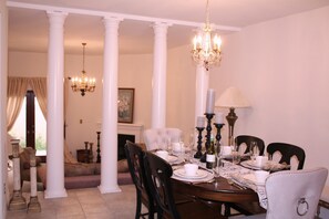 Formal Dining Rm w/ View of Living Rm & Patio