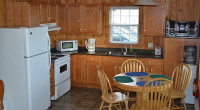 Pomquet Beach Cottages - Surrounded by mature hardwood trees!