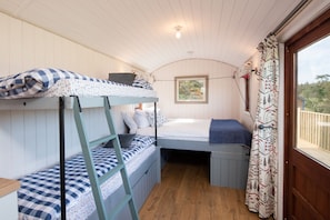 Foxglove - bedroom area with king size bed and full size bunk beds