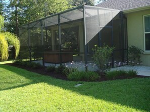 Screened Patio with Jacuzzi and BBQ
