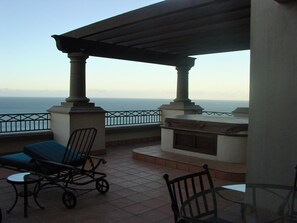 Private hot tub and sun-drenched balcony