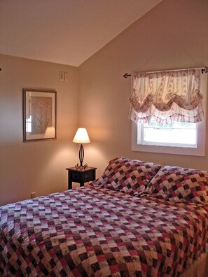 Bedroom with cathedral ceiling