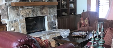 Downstairs living room with high ceilings and views to the golf course.