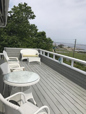 Front deck with view of playground & beach area for Latimer Point residents