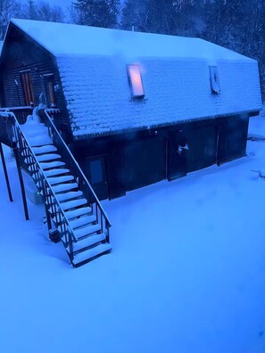 Rental Apartment is above the heated garage.  Winter entrance inside