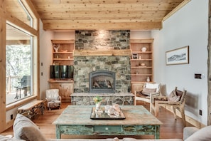 Beautiful warm gas fireplace with natural rock