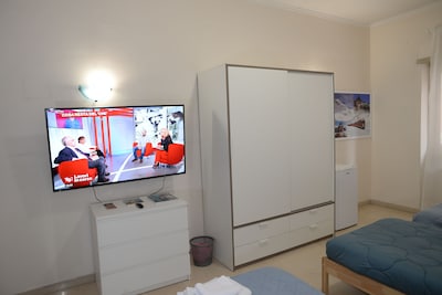 TRIPLE ROOM WITH BALCONY AND SAMSUNG TV LATEST GENERATION