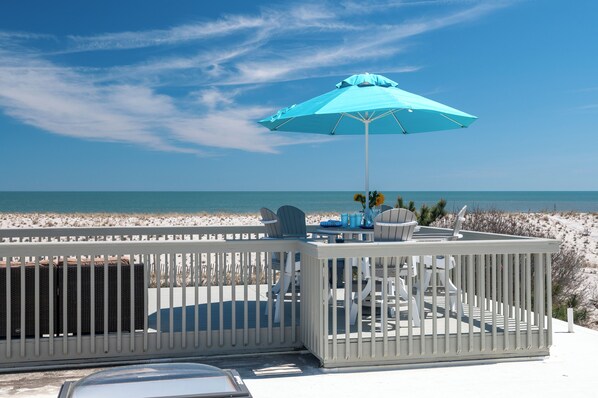 Steps to the beach or read on your private deck with the sound of the waves.