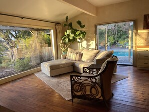 Kitchen seating area to pool (by Mitchell + Gold)