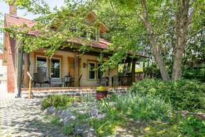 Covered front porch and front yard