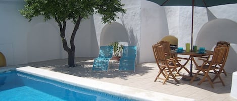 Walled patio with private pool